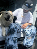 Dog4 view of the CHECKthefeed VX Classic Snowboard Pants - Dog Snow Camo Print CTF-VXCLASSICPANTSDOG Pants, 26/27 Unisex's model