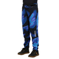 Kids Dharco Gravity Pants in black with blue and purple abstract patterns and a white logo on the lower leg.