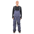 Endeavor 3L Shelter Bib Snowboard Pants in slate blue with branded suspenders and zippered pockets on a model.