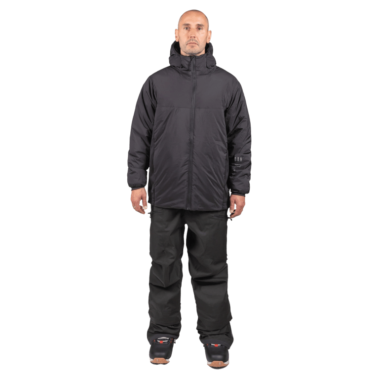 Front view of a man wearing a black Endeavor Aeroshield Insulated Snowboard Jacket with a hood and matching pants.