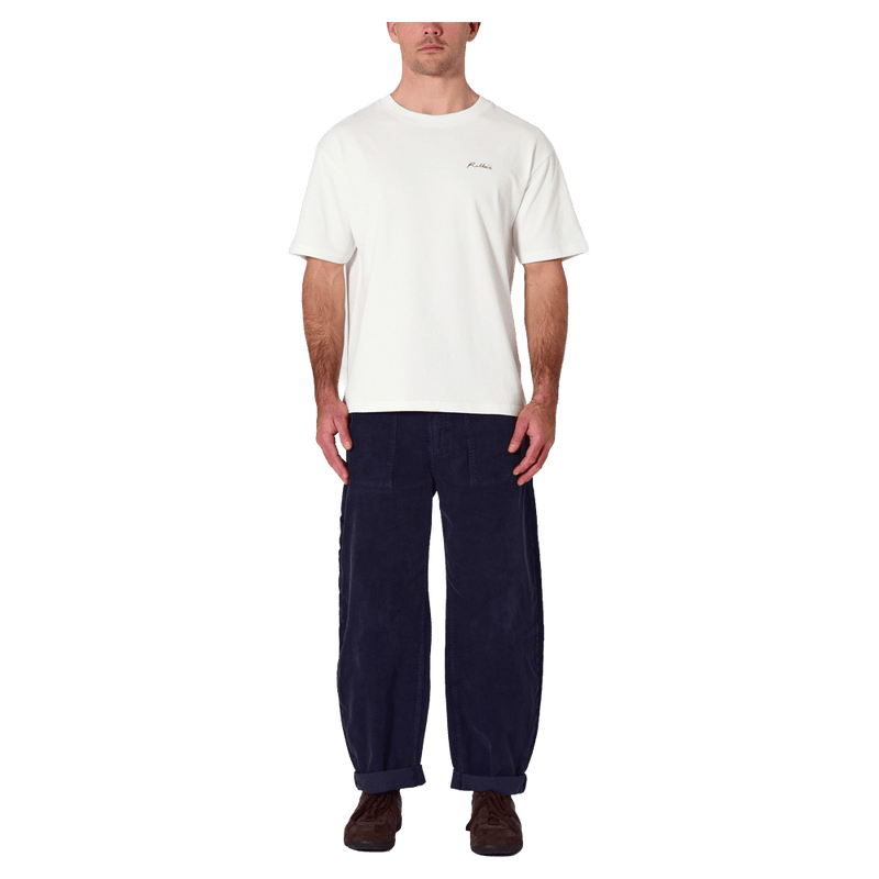 Front view of man in the Rollas Ezy Classic Tee in Colour Vintage White