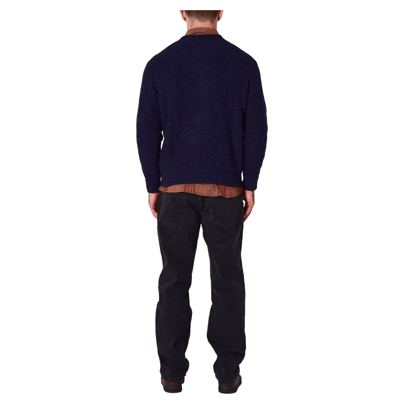 Back view of man in the Rollas Fishermans Tweed Crew in colour Dark Navy