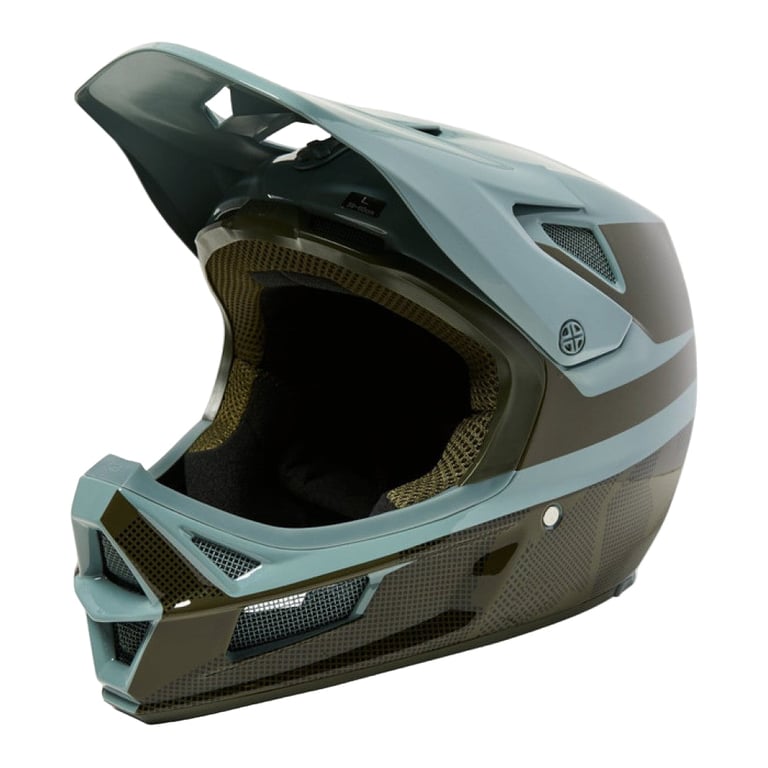 Sage green and olive Fox Rampage Comp Mips full-face mountain bike helmet with mesh vents and a visor.