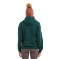 Back view of the XTM Hyams Hoodie in Pine colourway, unisex's model