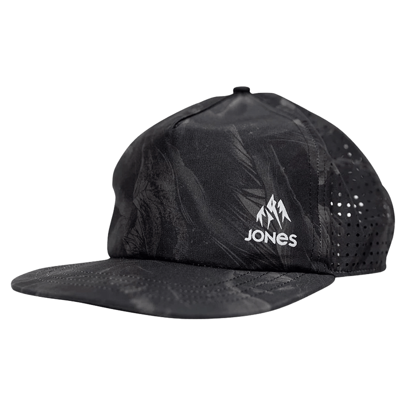 Jones Bootpack tech cap in black pattern with white logo, flat brim, and perforated side panels.