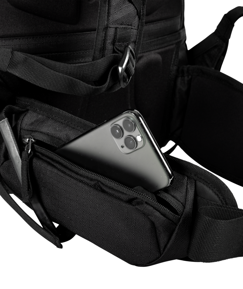 Jones Higher 32L Backpack close up of side waist pocket with phone inside