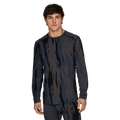 Man wearing Le Bent Midweight Thermal Crew ombre snow gum