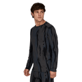 Man wearing Le Bent Midweight Thermal Crew ombre snow gum looking away