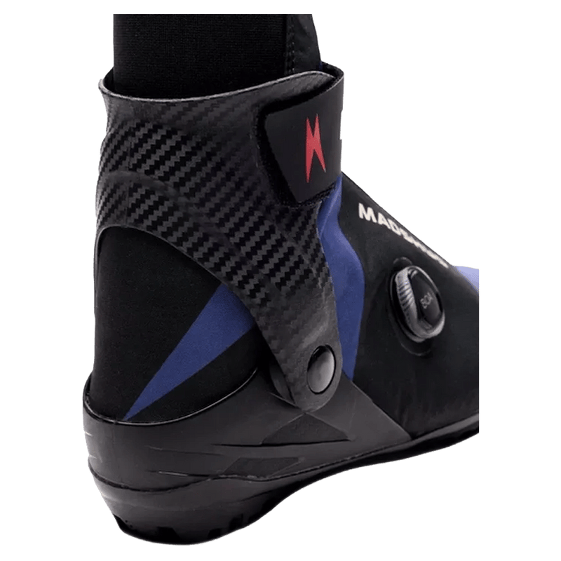Madshus Pulse Boa Skate Boot featuring a carbon fiber cuff, black and blue upper, and side-mounted BOA dial.