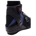 Madshus Pulse Boa Skate Boot featuring a carbon fiber cuff, black and blue upper, and side-mounted BOA dial.