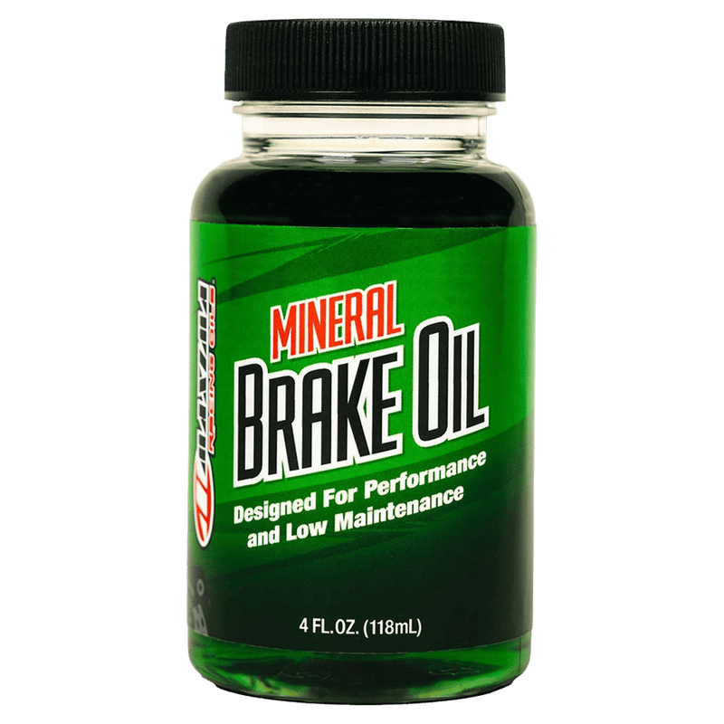 Maxima Mineral Brake Oil 118ml clear plastic bottle with green liquid, black cap, and green label.