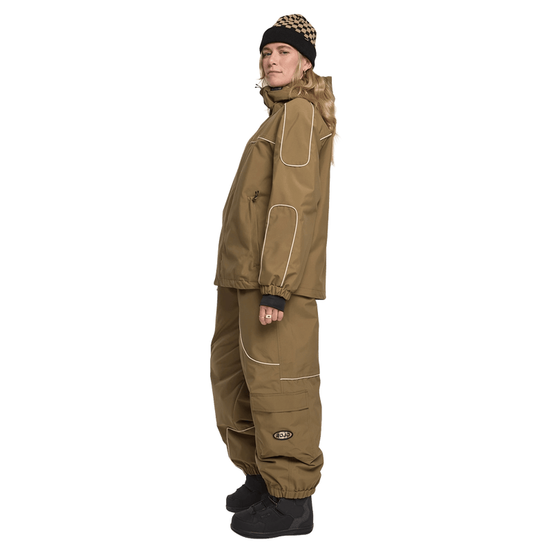 Side view of woman wearing the Rojo Nine Oh Ski Jacket - Womens in Cafe