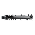Side profile of a black One Up Components Wave mountain bike pedal with a slim platform and metal traction pins.