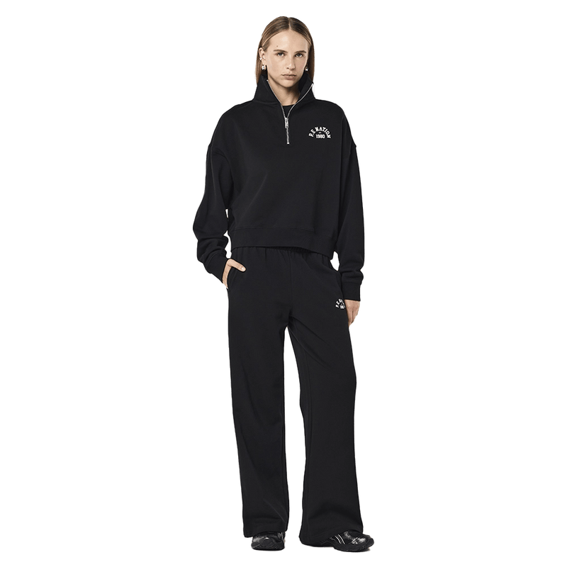 Full view of the PE NATION Established Oversized Quarter Zip Black Sweater, 26/27 Womens's model