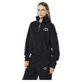 Side view of the PE NATION Established Oversized Quarter Zip Black Sweater, 26/27 Womens's model