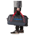 Carried view of the Patagonia Black Hole®_Wheeled_Duffle_70L_SmolderBlue_AnimatedRed 49382 Bags, 26/27 Unisex's model