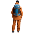 In action view of the Burton AK Dispatcher Backcountry Backpack in Blue Teal colourway, unisex's model