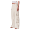 Side view of women in the Relaxed Sailor Long Jeans in colour Cream