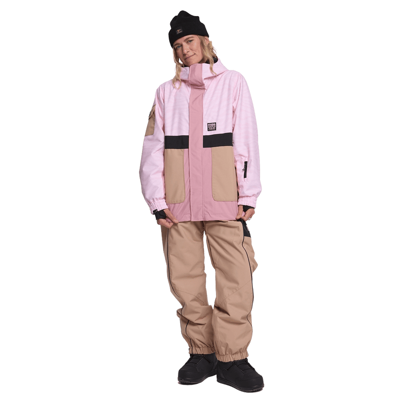 Front view of women in the Rojo Retro Star Ski Jacket - Womens in Pink-a-boo