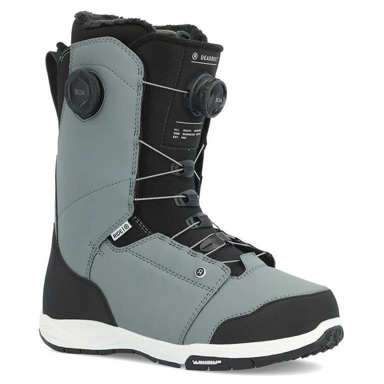 Ride Deadbolt snowboard boots in grey and black with dual BOA dials, white midsole, and Michelin rubber sole.