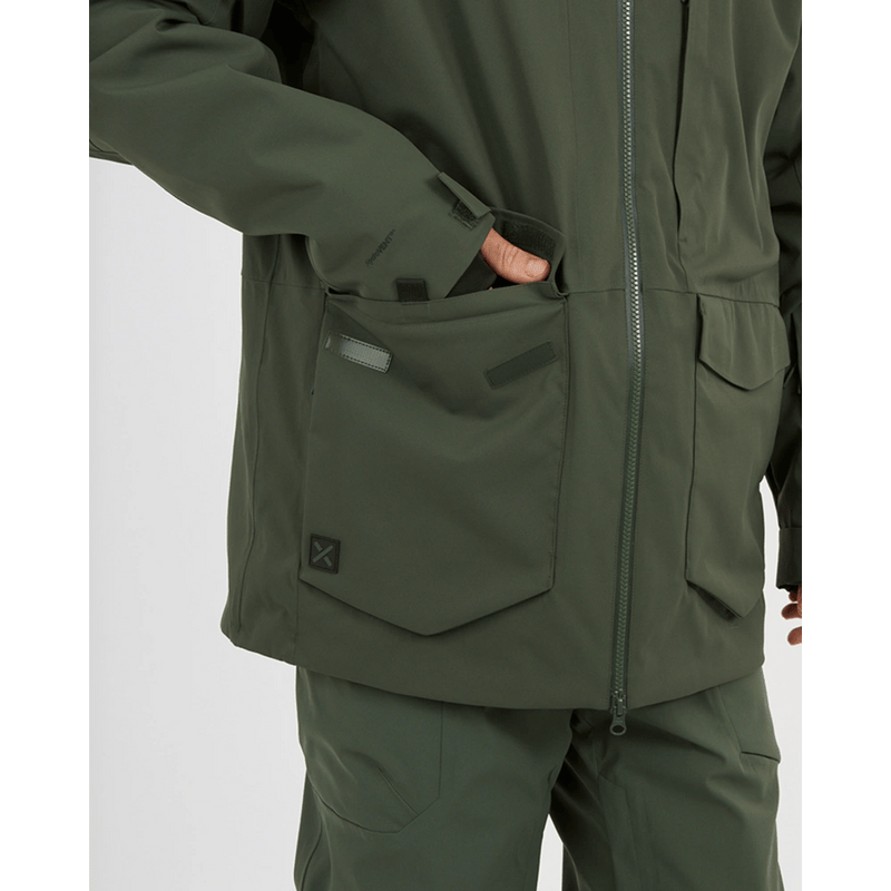 Pocket view of XTM Ridge Line Ski Jacket in colour Ivy