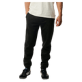 Black Rip Curl Anti Series Departed Trackpant with a tapered fit, cuffed ankles, and side pockets on a model.