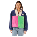 Woman wearing a Rip Curl Block Party polar fleece with blue, pink, green, and cream color-blocked panels and quarter-zip.
