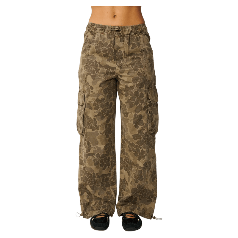 Rip Curl women's Paradise Camo cargo pants in olive green with floral print, wide legs, and side utility pockets.