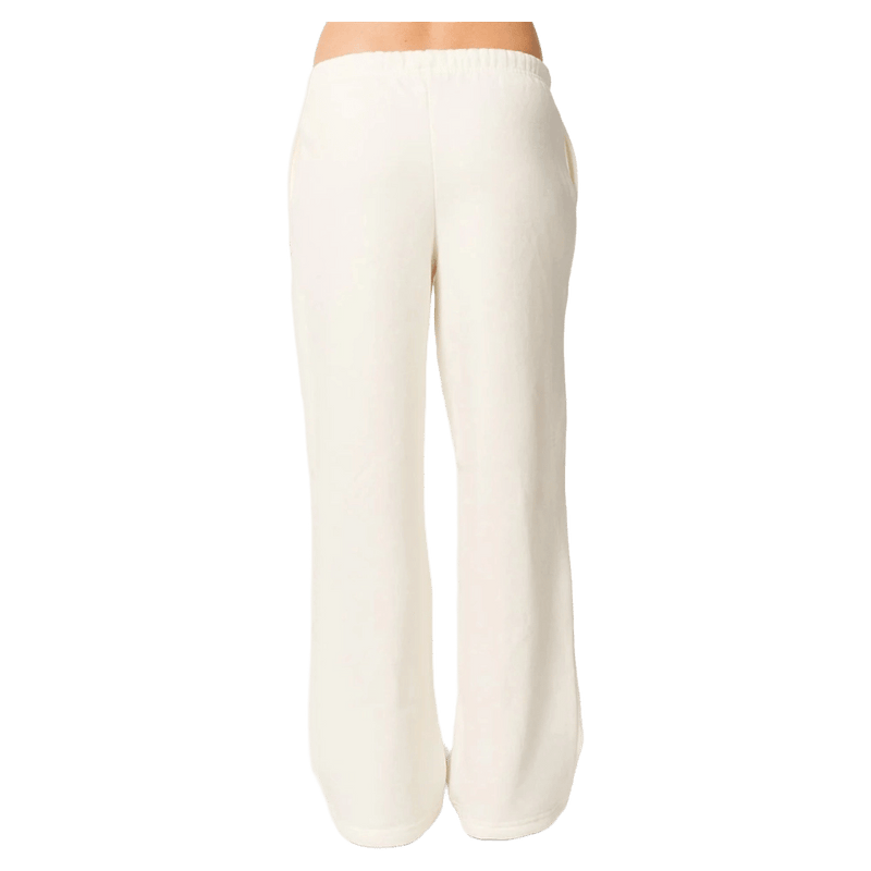 Back view of Rip Curl Surf Puff wide leg trackpants in off-white with an elastic waistband.