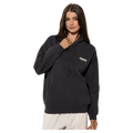 Woman wearing a charcoal Rip Curl Surf Revival Heritage Hoodie with a drawstring hood and front kangaroo pocket.