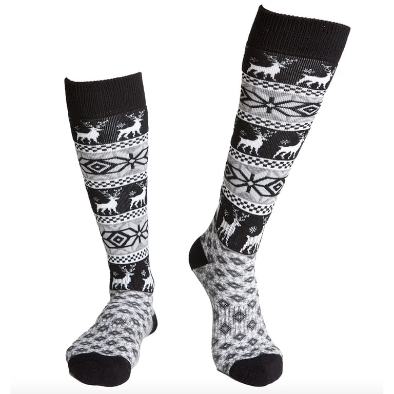 Women's Rojo Nordic Snowflake knee-high socks with black, white, and grey reindeer and snowflake knit patterns.