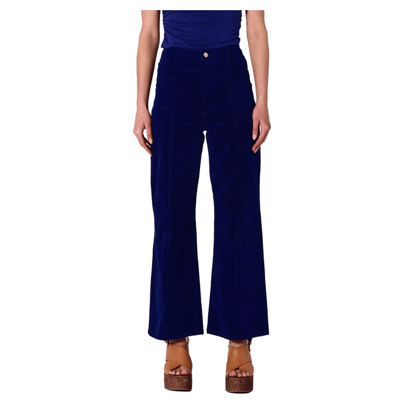 Front view of a women in the Sailor Deco Marine Cord Jeans in colour Marine