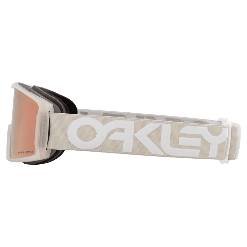 Side view of the Oakley Line Miner XM Goggles in Cool Grey, Prizm Rose Gold lens, unisex model