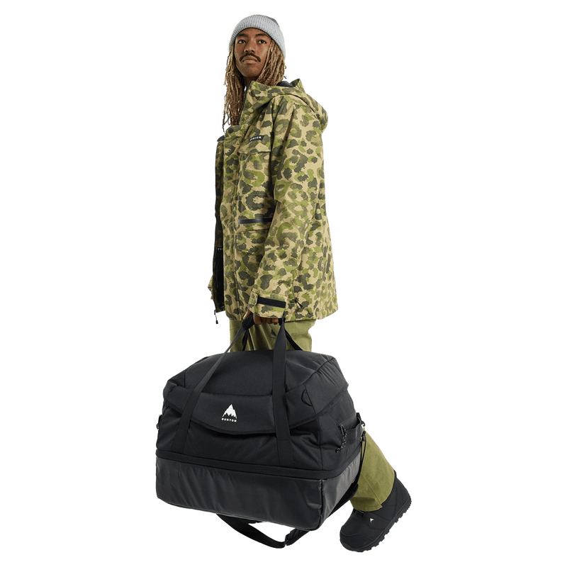 In action view of the Burton Gig 70L Duffle Bag in True Black colourway, unisex's model