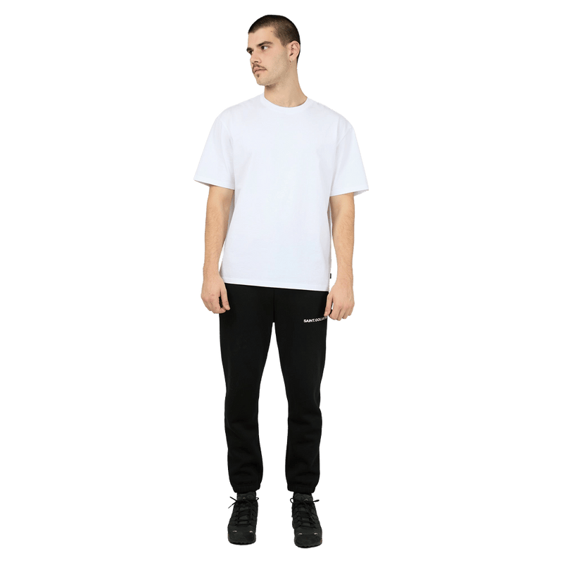 Full-body view of the St Goliath ID Sweatpants in Black colourway, men's model