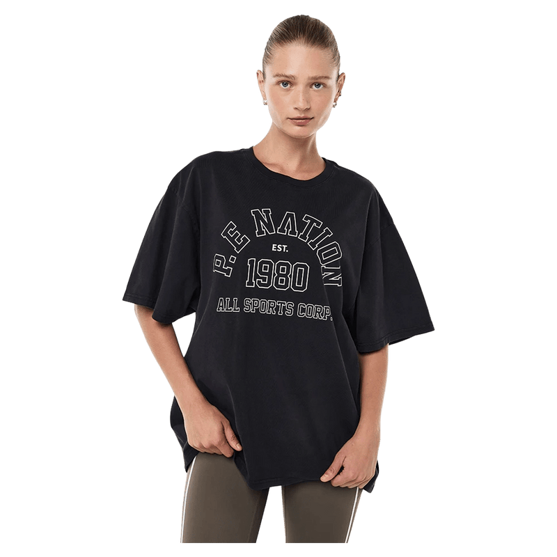 Main view of the PE NATION Altitude Tee Washed Black Tee, 26/27 Womens's model