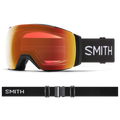 Smith I/O Mag XL snow goggles with red-orange mirrored lens, black frame, and adjustable black strap with white logo.