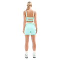 Back view of the PE NATION Backcheck Bike Short Aqua Bottoms, 26/27 Womens's model