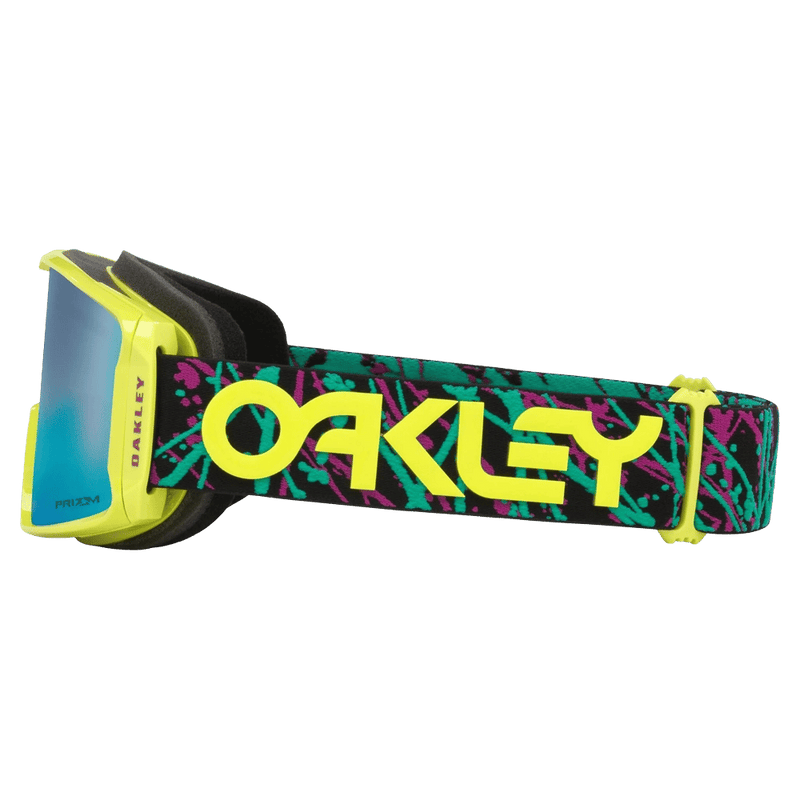 Side view of the Oakley Line Miner XM Goggles in Jaxson Blue, Prizm Sapphire lens, unisex model