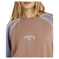 Front view of women wearing the Billabong Cool Times Crew - Womens in Sweet earth