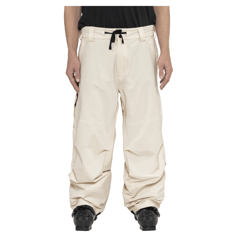 Front view of the Armada Chairman 2L Pants in Cream colourway, unisex's model