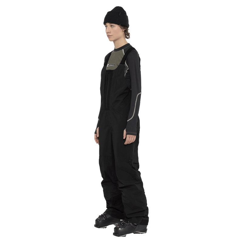 Side view of the Armada Rayleigh 3L Bib in Black colourway, women's model