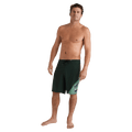Full-body view of the Volcom Vee Bee Mod Short in Scarab colourway, men's model