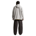 Back view of the Nike Sportswear Club Hoodie in Dark Grey Heather colourway, unisex model