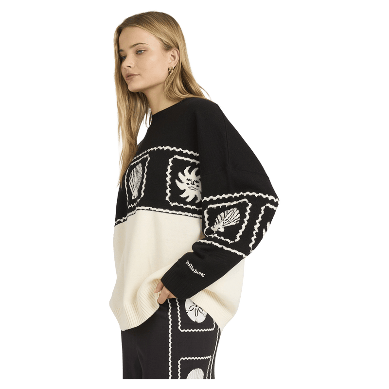 Side view of women wearing the Billabong Sea Side Dreamer Sweater - Womens in Black Sand