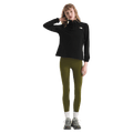 View of a woman wearing The North Face Cedar Trail Grid Fleece ¼ Zip Jacket for Women in Black featuring a quarter zip and embroidered white logo on the left chest
