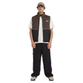 Front view of man wearing the Billabong Journey Puffer in Black