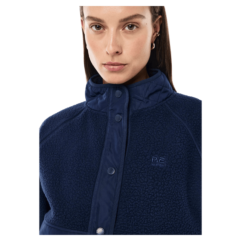 Close view of the PE NATION Technique Quilt Dark Navy Jacket, 26/27 Womens's model