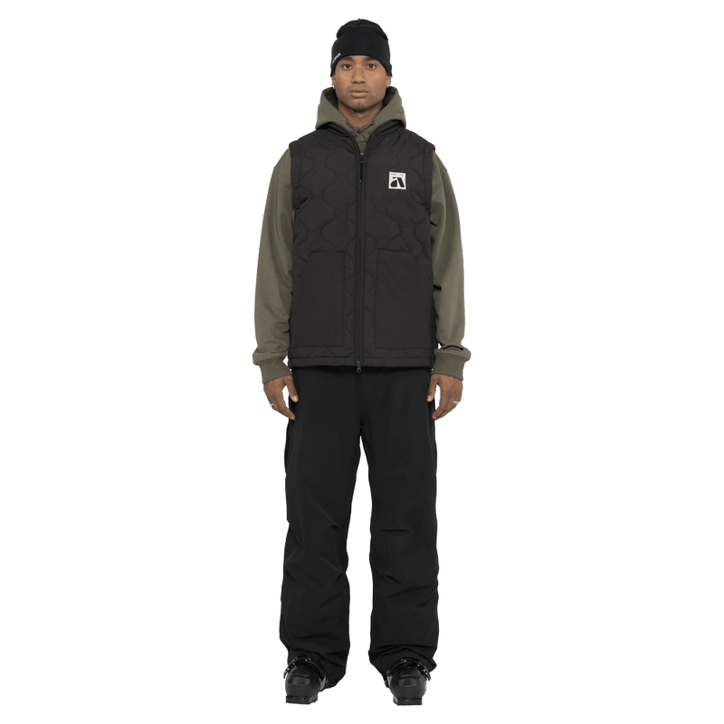 Full-body view of the Armada Chairman 2L Pants in Black colourway, unisex's model