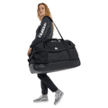 In action view of the Burton Flight Attendant 90L Duffle Bag in True Black colourway, unisex's model
